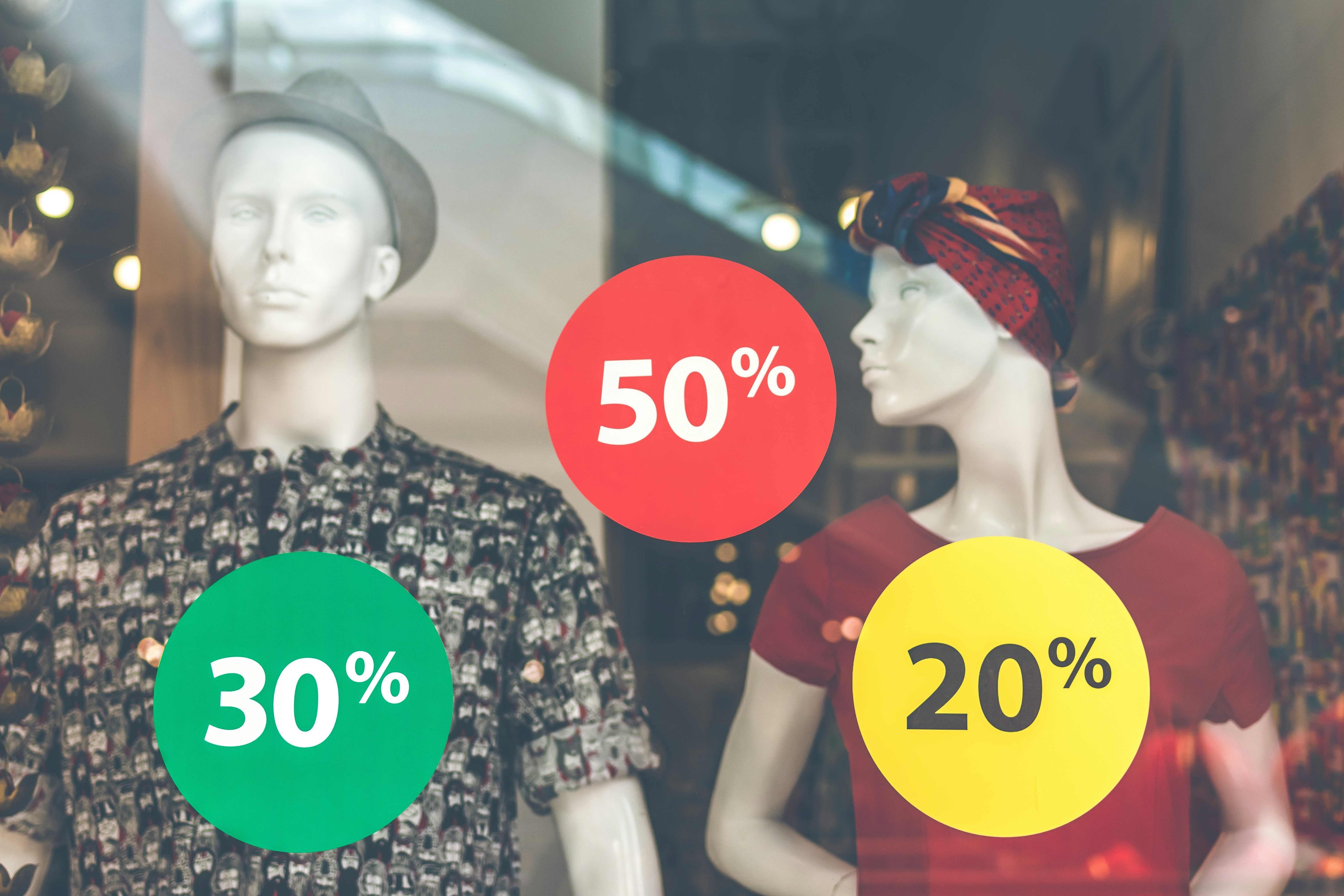 two-male-and-female-mannequin-wearing-clothes, outlet